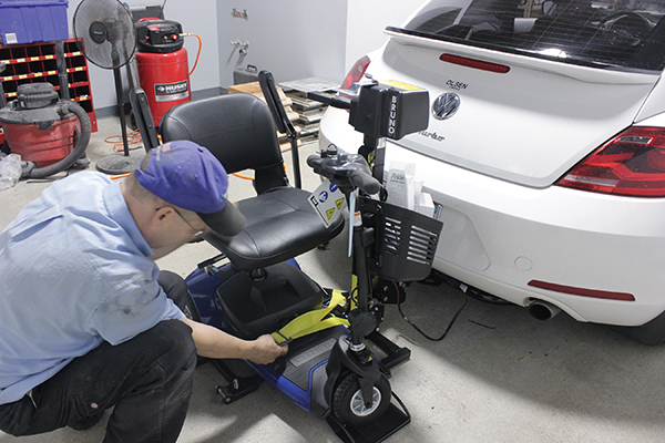 Kohll’s Pharmacy & Homecare mounts vehicle lifts as part of its mobility program.