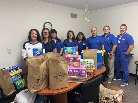 Employees of CenterWell Home Health’s Parkersburg, W.Va., branch, which collected the largest amount of food and monetary donations in this year’s food drive (left to right): Jackie Benton, RN, branch director; Sara Harrington, RN, clinical assessment advisor; Debra Harber, LPN; Abbi Sturm, OT, clinical liaison; Janet Eliadis, RN; Chad Copeland, PT; Jim Forshey, PTA; and Jordan Bailey, RN. (Photo: Business Wire)