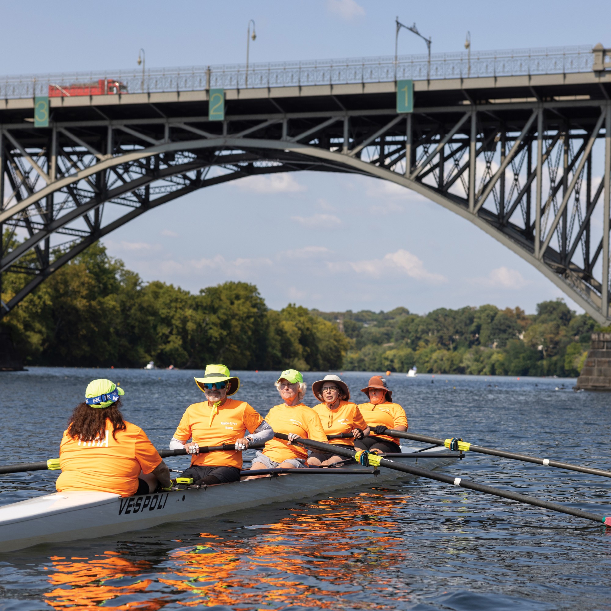 BAYADA Regatta rowers on the river.