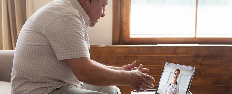 older man on a telehealth appointment