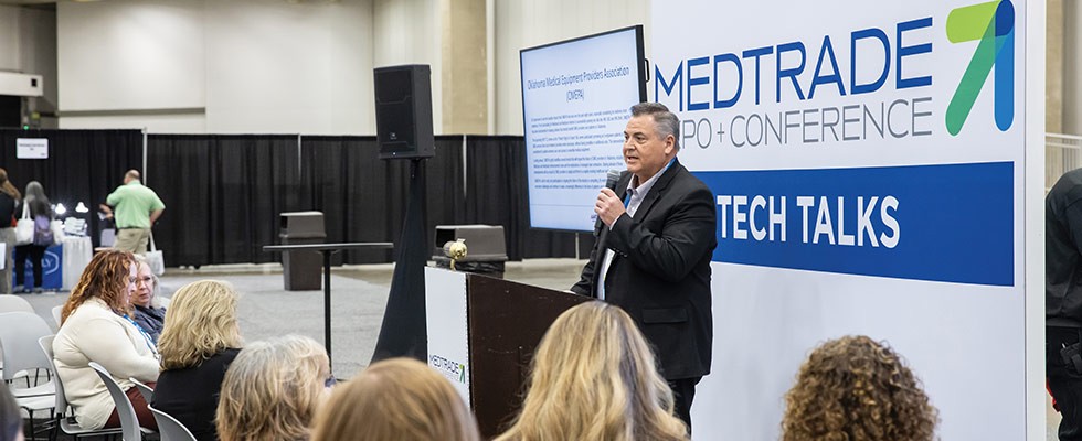 Presenter speaking at Medtrade Expo & Conference tech talk.