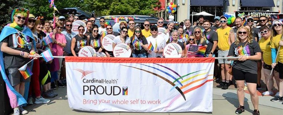 Cardinal Health employees attend a Pride parade. 