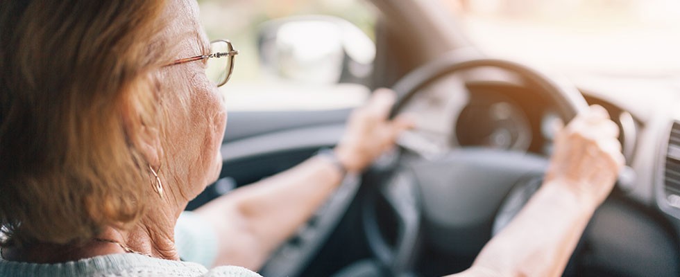 elderly woman driving