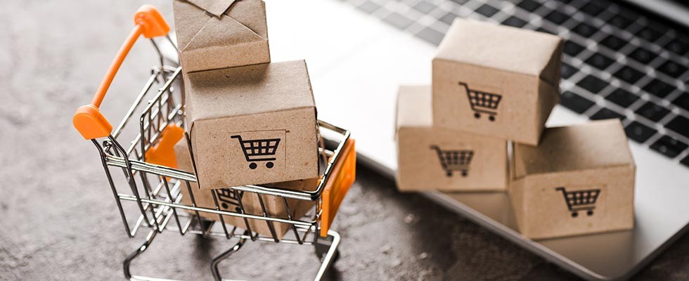 tiny shopping cart filled with little boxes