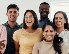 Coworkers smiling and laughing