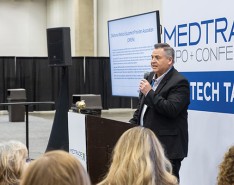 Presenter speaking at Medtrade Expo & Conference tech talk.